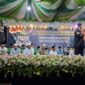 Camat Ambunten Moh. Zaini, S.Sos., M.Si Haul Akbar yang diselenggarakan Pimpinan Ranting GP Ansor Desa Bukabu, Kecamatan Ambunten, Kabupaten Sumenep.