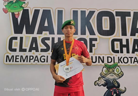 Prajurit Yonif TP 931/Kostrad. Prada Moh. Habibul Ahkam sukses mempersembahkan medali emas pada ajang Kejuaraan Provinsi (Kejurprov) Tinju Amatir Clash of Champions Wali Kota Cup 2026 yang digelar di Hall Stadion Wilis, Kota Madiun.