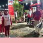 Camat Gapura Kamiludin Didampingi Sekcam Darto Santoso Melepas Lomba Gerak Jalan Dalam Rangka Memeriahkan HUT RI ke 81 di Kecamatan Gapura, Sabtu (22/08/2026) malam