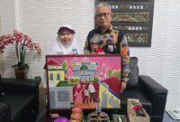 Ana Syifaul Millah Bersama Direktur BPRS Hairil Fajar 