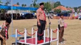 Camat Ambunten Moh. Zaini, S.Sos, M.Si Saat Pimpin Apel Upacara Peringatan Hari Pramuka ke-65 di Lapangan Ambunten Jum'at (14/08/2026)