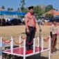 Camat Ambunten Moh. Zaini, S.Sos, M.Si Saat Pimpin Apel Upacara Peringatan Hari Pramuka ke-65 di Lapangan Ambunten Jum'at (14/08/2026)