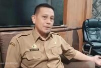 Kadisnaker Kabupaten Sumenep Drs. Mustangin, M.Si
