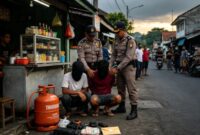 Ilustrasi Al Penangkapan Dua Pencuri Oleh Pihak Kepolisian 
