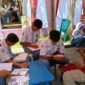 Pustakawan Ahli Muda Dispusip Kabupaten Sumenep Drs. Syaiful Bahri Bersama Siswa di Pekan Literasi SMAN 1 