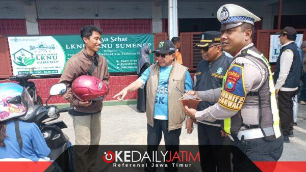 Wabup KH Imam Hasyim SH MH Didampingi Kepala UPT PPD Sumenep Samtiono SH MH di Acara Opgab Bersama di Jalan Raya Sumenep - Pamekasan di Desa Gunggung Kecamatan Batuan, Jum'at (09/10/2026)